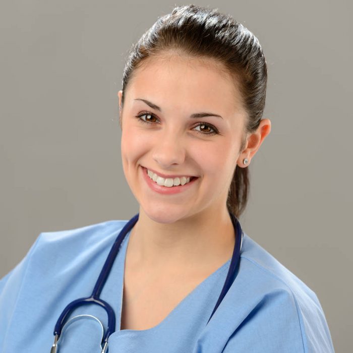 Portrait of smiling young female nurse with stethoscope